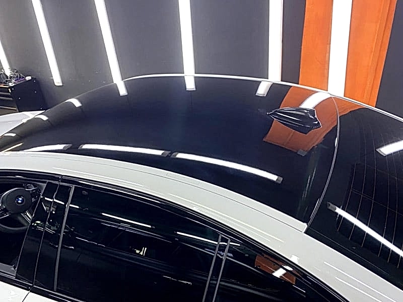 оклейка черной пленкой крыши bmw